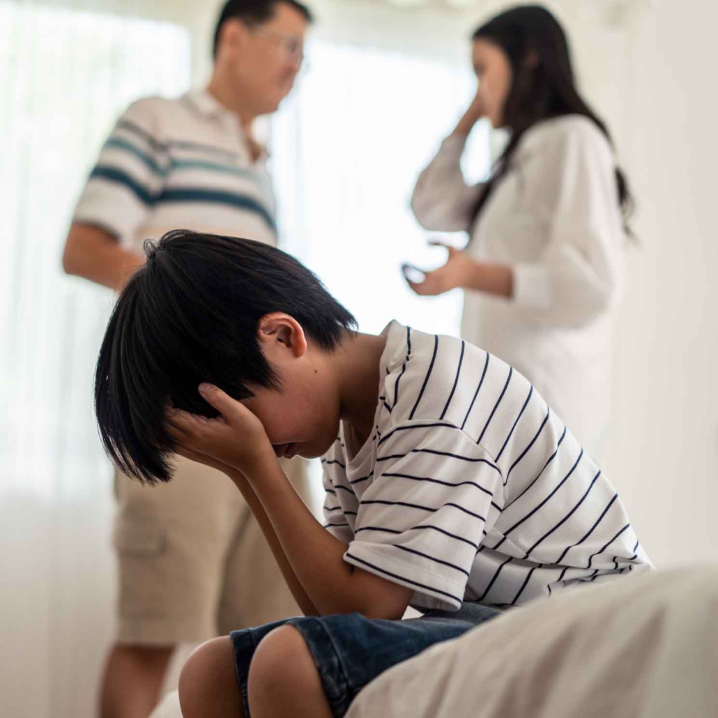 Desperate woman talking to professional psychologist at therapy session in his office